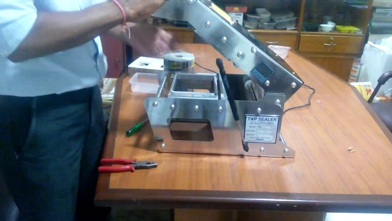 Operating the TS-200: A Manual Sealing Machine for Container Sealing Operating the TS-200: A Manual Sealing Machine for Container Sealing