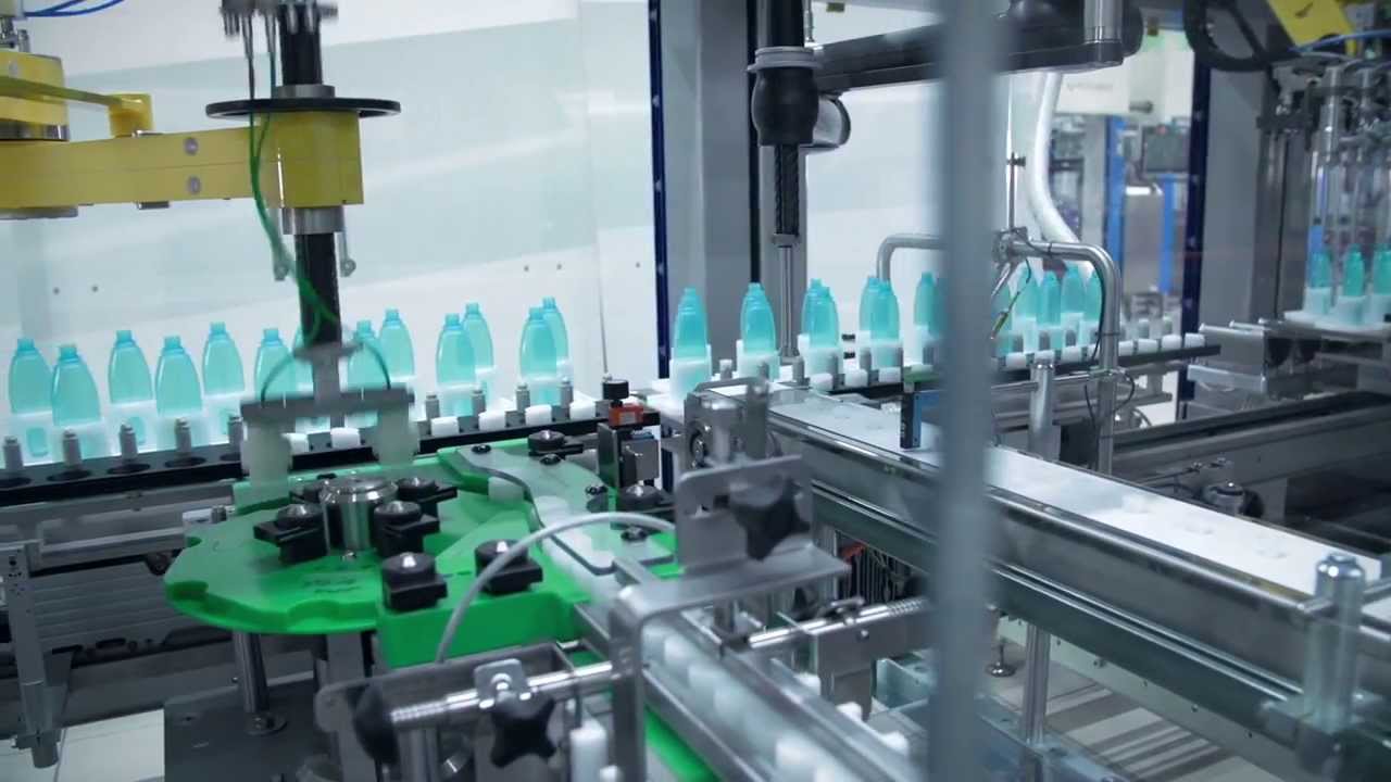 PET Bottle Gravimetric Filling: Integrated Packaging Machine