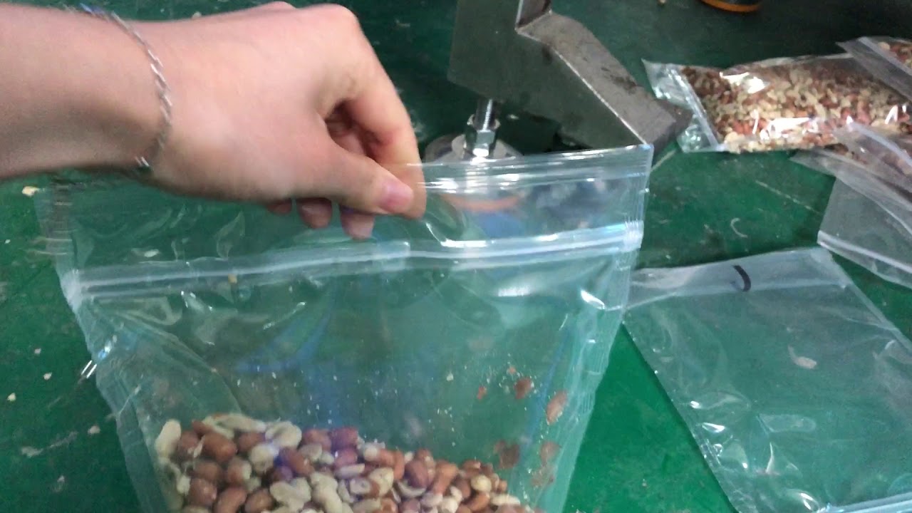 Packing Machine for Zipper-Sealed Standing Pouch Bags Packing Machine for Zipper-Sealed Standing Pouch Bags