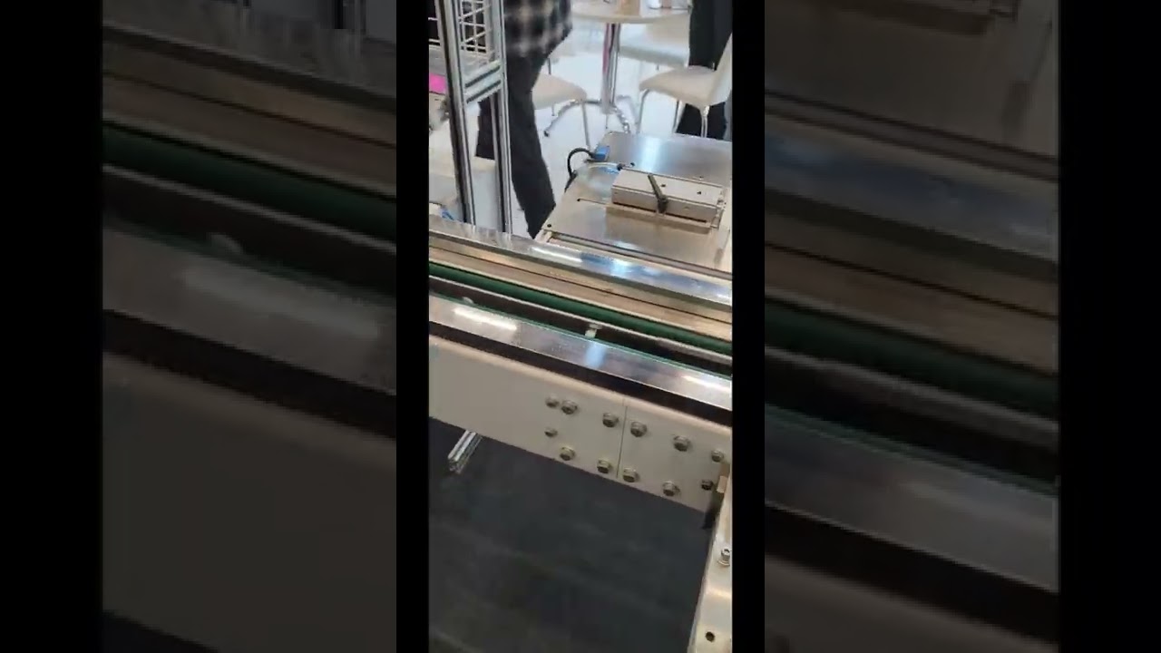 Packing Paper Cups and Cartons with a Machine Packing Paper Cups and Cartons with a Machine