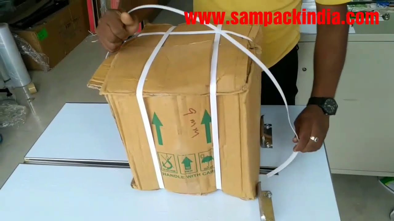 Strapping Machine for Box Packaging Strapping Machine for Box Packaging