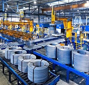 Wire coil compacting and strapping machine | Wire coil compactor