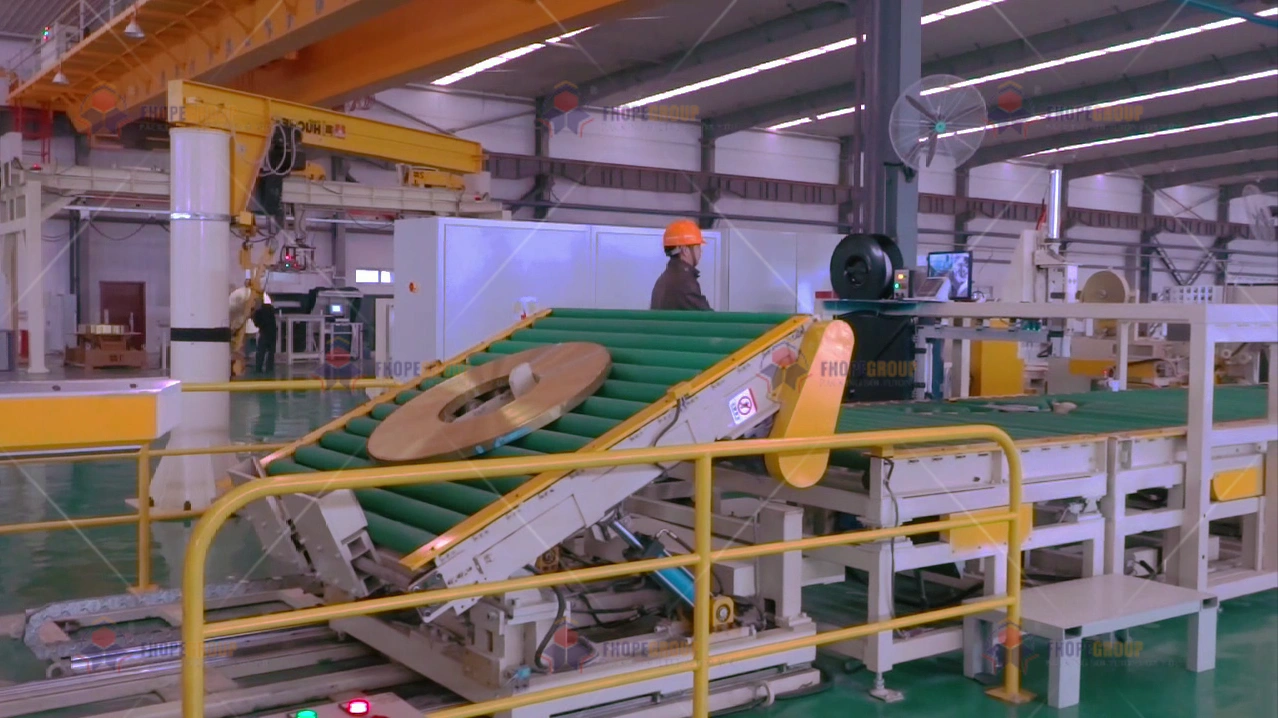Steel coil packing line — A fully automatic line, as one integrated system, is what the turnkey contract delivers and accepts as a whole