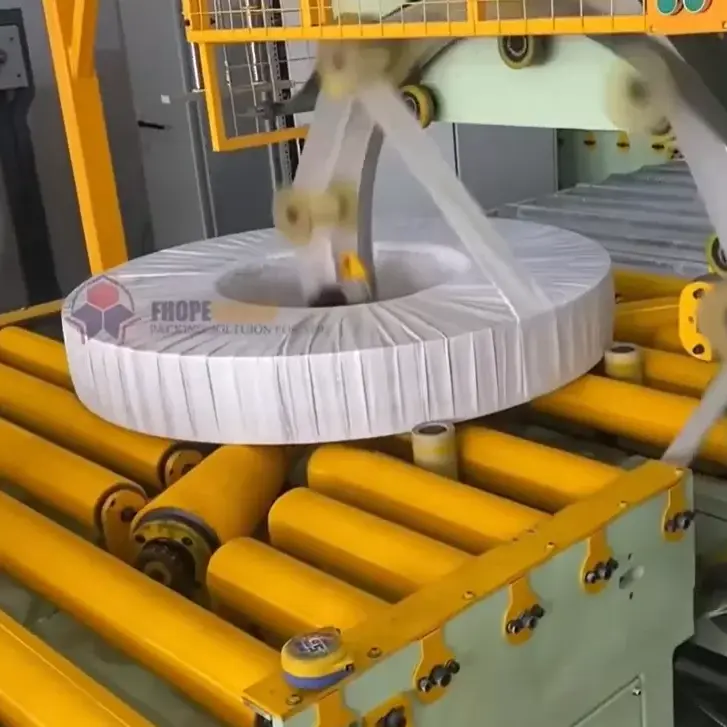 Steel coil packing line — The wrapping ring sits between strapping and palletizing; its cycle time is usually the line bottleneck the integrator must guarantee.